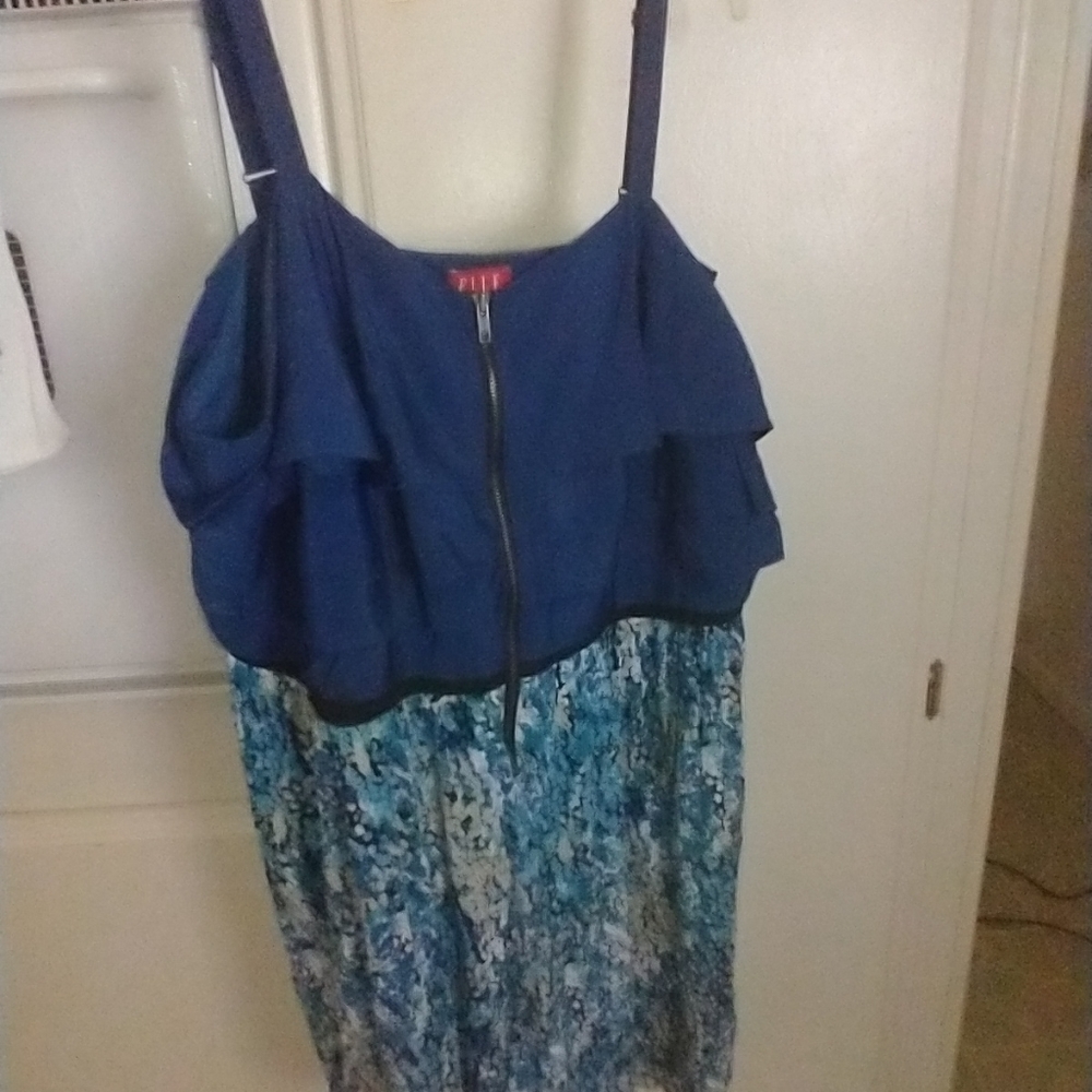 Elle Brand plus size dress with adjustable spaghetti straps and front zipper.